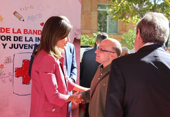 Queen Letizia wore Atos Lombardini Coat and Queen Letizia wore Uterque Black leather pants, Magrit pumps at Banderita Day 2018