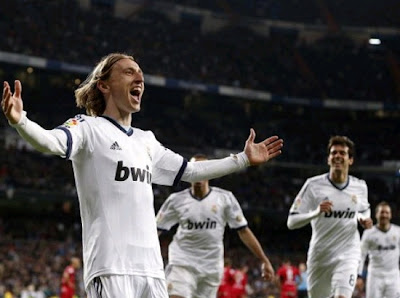 Modric celebrates a goal with Real Madrid