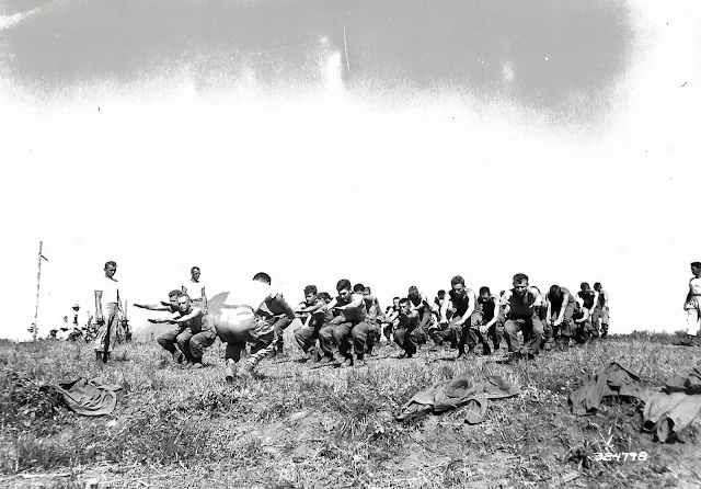 US Army soldiers exercising while at Lipa Airfield.  Image source:  United States National Archives.