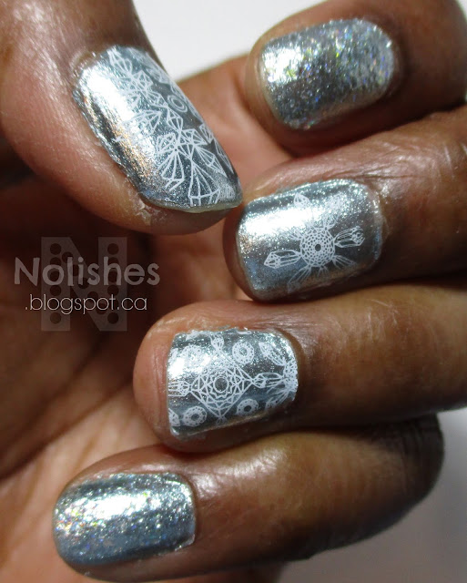 Manicure using Nicole by OPI 'Rich in Spirit' and China glaze 'Snow Globe'