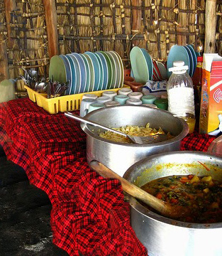 One-pot spicy Kivu fish stew unique flavor is due to the spices, vegetables and traditional maize meal. 