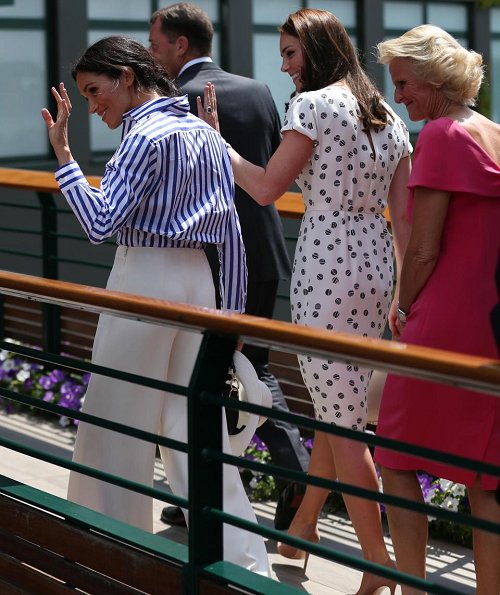 Kate Middleton wore a bespoke Jenny Packham dress. Meghan Markle wore Ralph Lauren Striped Cotton Shirt and Charmain Silk Wide leg Pant