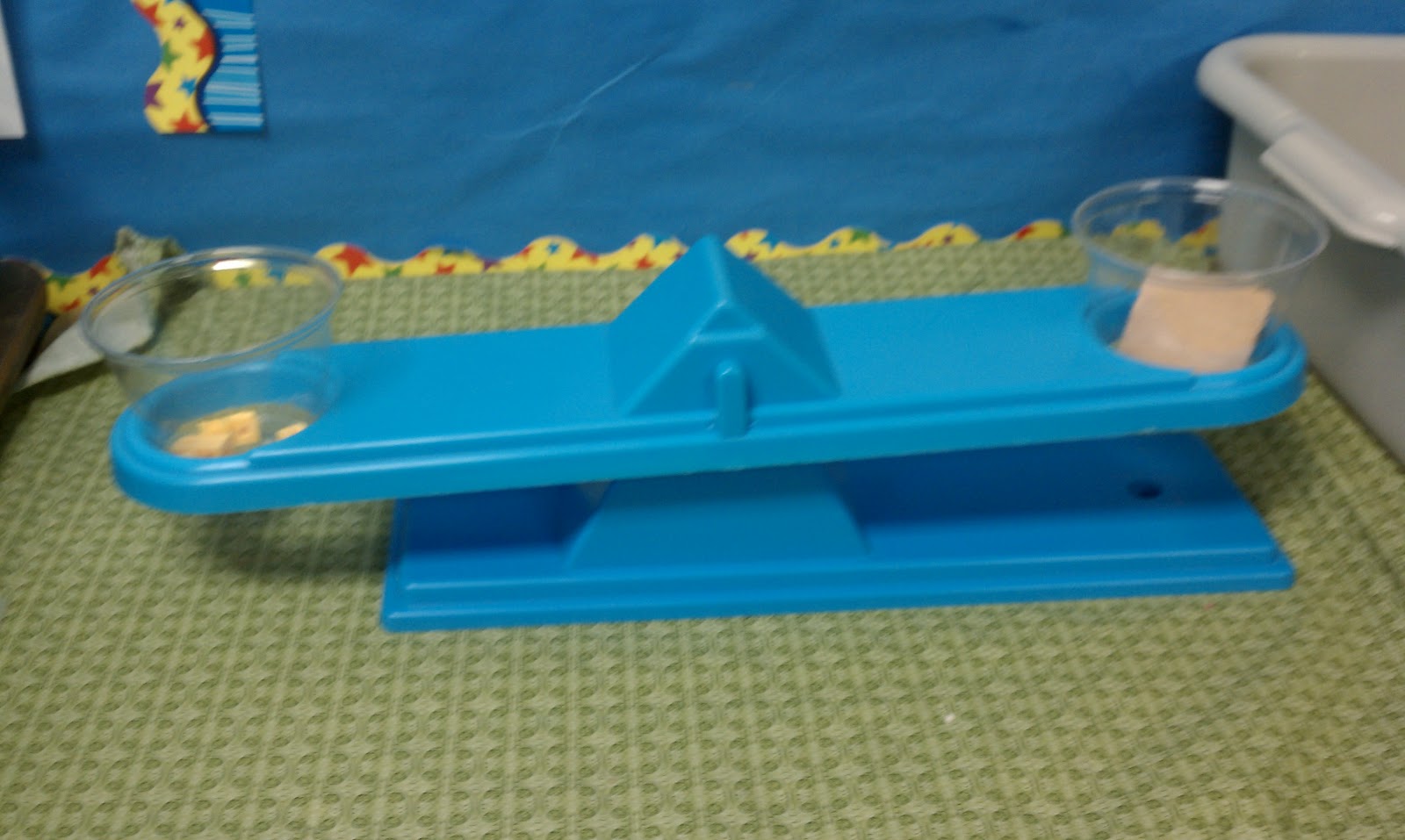 Science Gal Measuring mass....