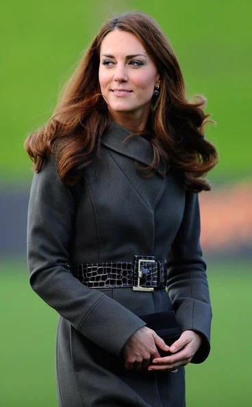 Kate Middleton wore Alexander McQueen green wool coat and Gianvito Rossi shoes, Prada dress