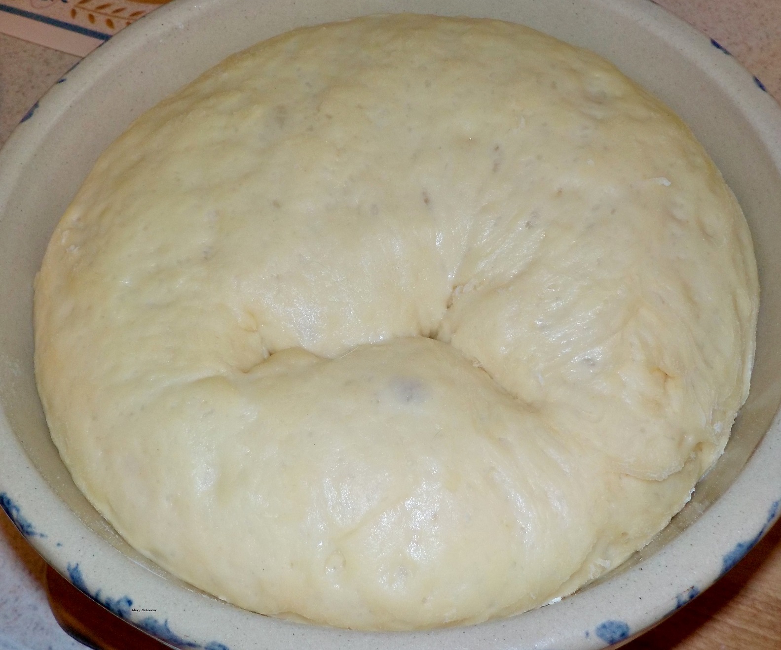 Пирог змея. Как выглядит поднявшееся тесто. Как выглядит тесто на ветнине литуаля.
