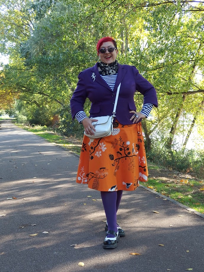 Señora Allnut: purple jacket & orange