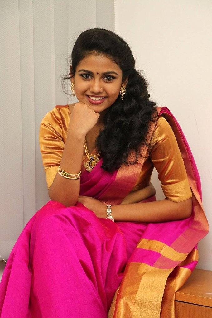Glamorous Chanai Girl Rahaana Long Hair Photos In Traditional Red Sari