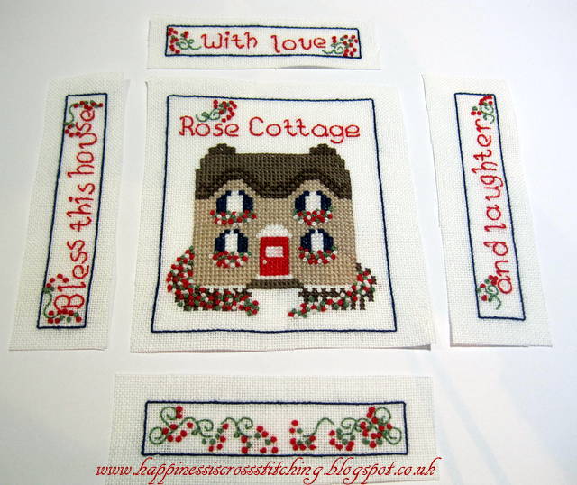 Cross stitched cottage with pretty french knot flowers showing a tutorial how to finish into a pretty pincushion 