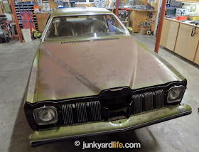 Front nose is missing on the 1973 Pontiac Grand Am in Golden Olive paint. New soft Endura nose is needed.