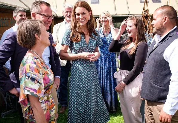 Kate Middleton wore a short sleeved printed dress by Sandro, Castaner Carina wedge, Accessorize polly petal drop earrings