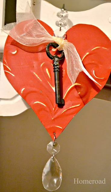 red tin heart with bow, key and bling