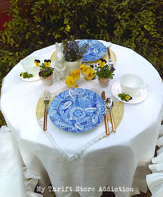 spring flowers blue and white garden table 