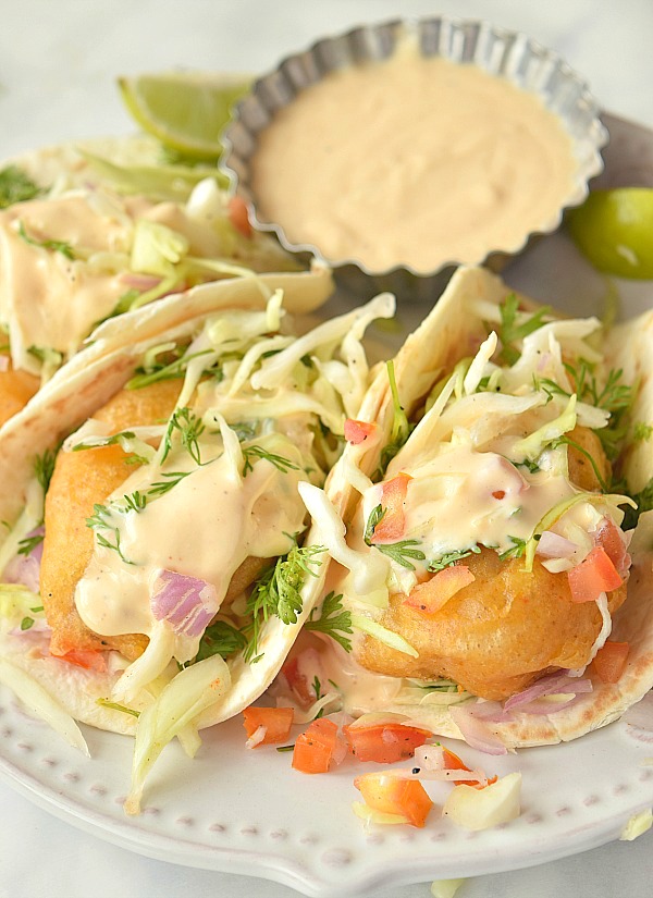 Baja fish taco with chipotle crema served on a plate