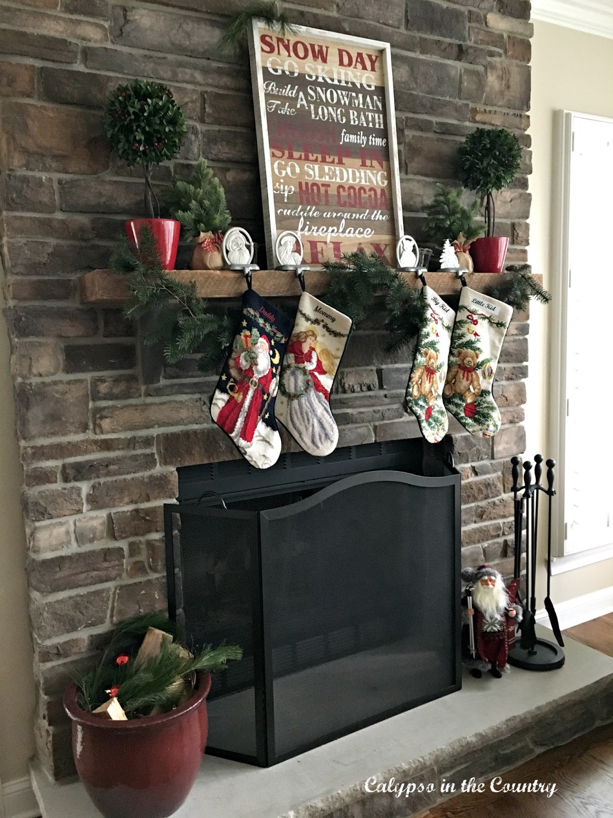 Stone Fireplace with Rustic Sign for Christmas Stone Fireplace with Rustic Sign for Christmas