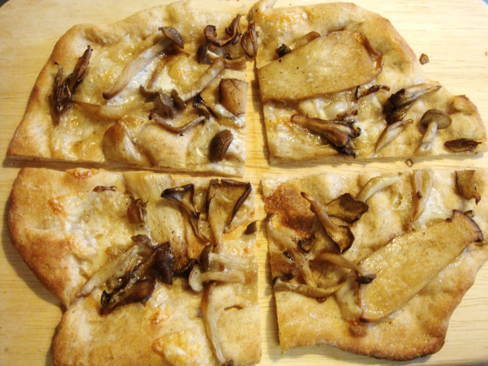 the little olive branch pizza with wild mushrooms and fontina cheese