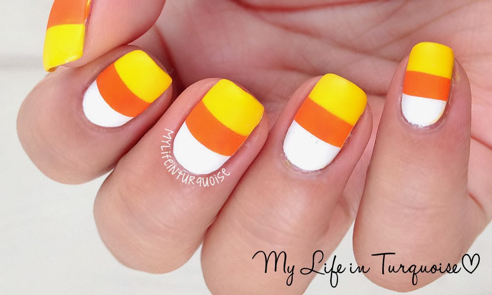 8. Halloween nail art with candy corn - wide 9