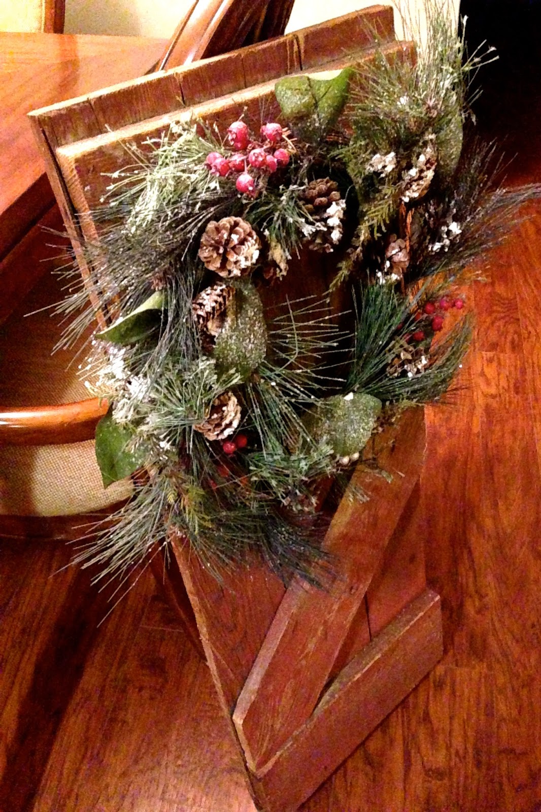 DIY Why Spend More Barn door = great backdrop for wreaths