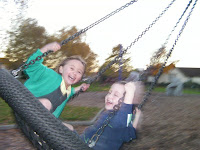 swinging basket milton park blurred picture with movement and laughter