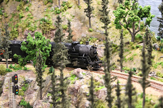 Locomotive 3725 along the mountain bluffs