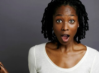 Surprised young African american woman