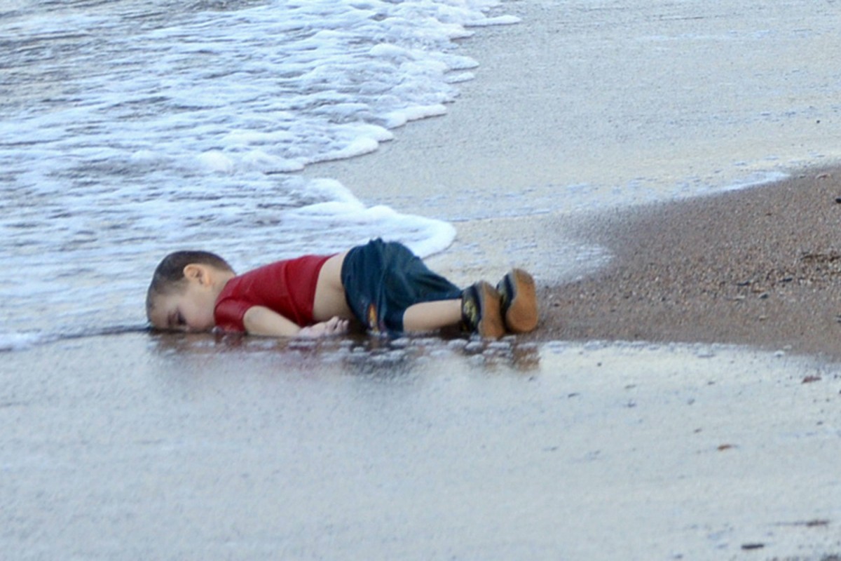 Image result for image of syrian boy on beach