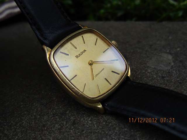 bulova longchamp gold watch