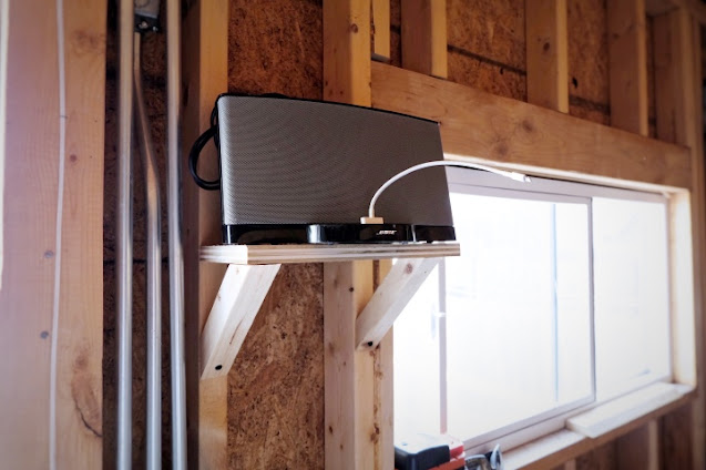 shelf for a speaker installed