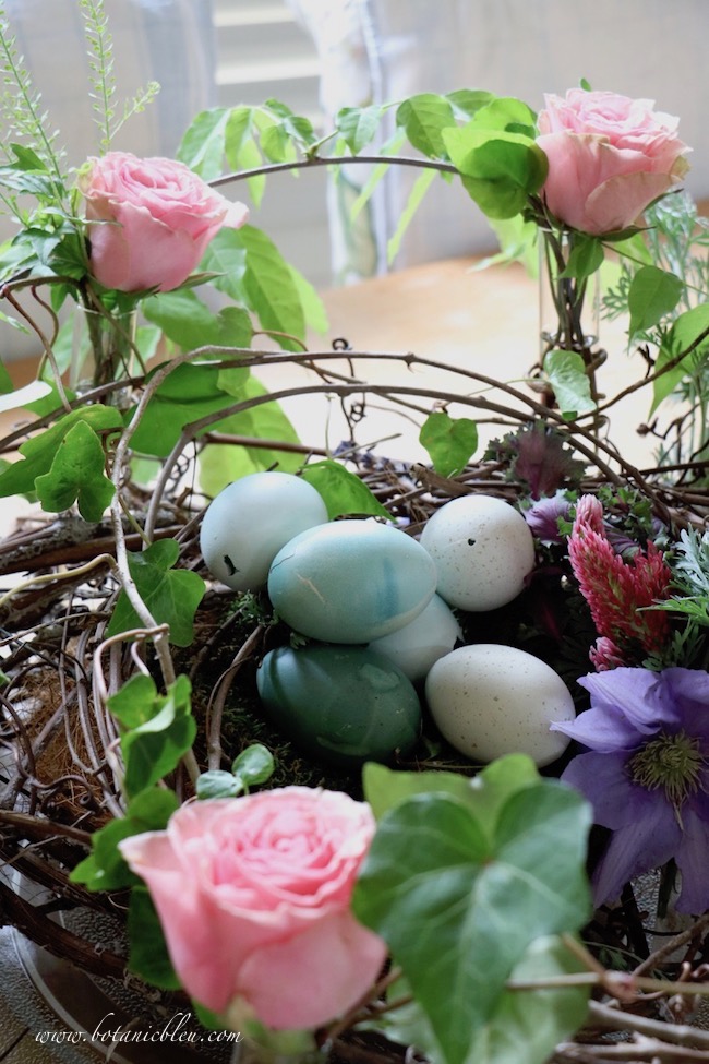 Spring celebration grapevine bird nest centerpiece with fresh flowers