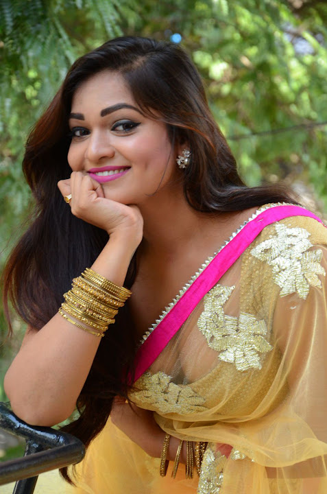Ashwini Cleavage in Yellow Saree