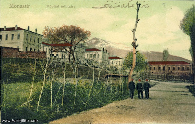 Воената болница на разгледница од 1908 година. Денес Студентски центар. Издавач: Attar Faik. Неговата издавачка дејност почнува околу 1908 и трае сé до Балканските војни 1912 година. Сите негови разгледници се во боја - рачно боени, и се на два јазици. Францускиот е секогаш на левата горна страна, а турскиот горе десно, со арапската-старотурската азбука. Бидејќи не постои никаков податок за годината на издавање, според мотивите на самите разгледници и денот на нивното испраќање периодот би бил, како што нагласив, од 1908 до 1912 година. Исто така, и за печатницата во која се печатени овие разгледници немаме никакви податоци, но се работи за печатница од висок квалитет. Неговите разгледници се претежно поврзани со турската армија. Тука се Црвената и Белата касарна, Воената болница, Воената академија, но и објекти и места кои беа карактеристични за градот.