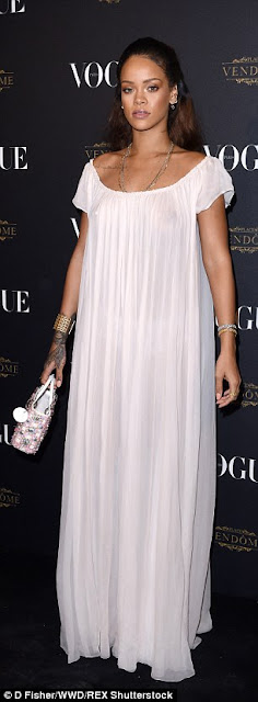 Rihanna Goes Braless In Sheer Nightwear Style Dress At Vogue Party 