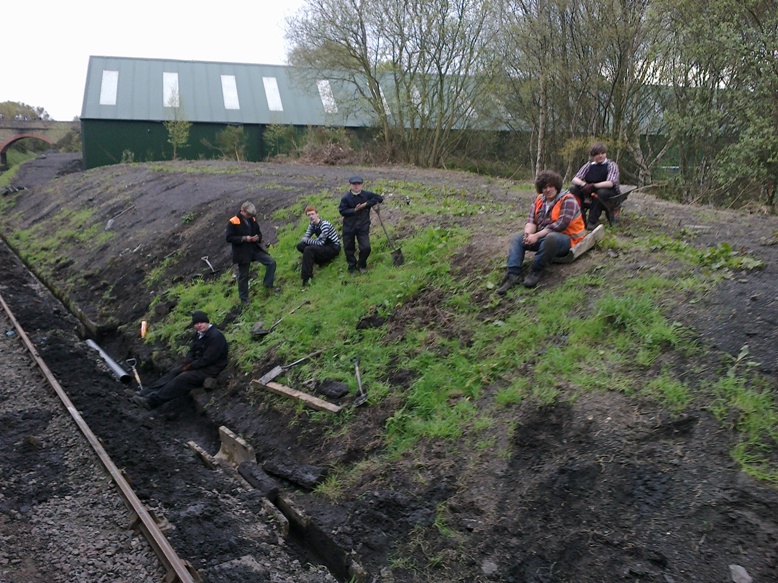 Volunteers clearing the drainage channel north of the signalbox