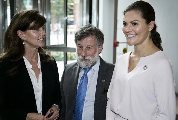 Crown Princess Victoria wore By Malene Birger pumps and she carried By Malene Birger bag, pink top and trousers