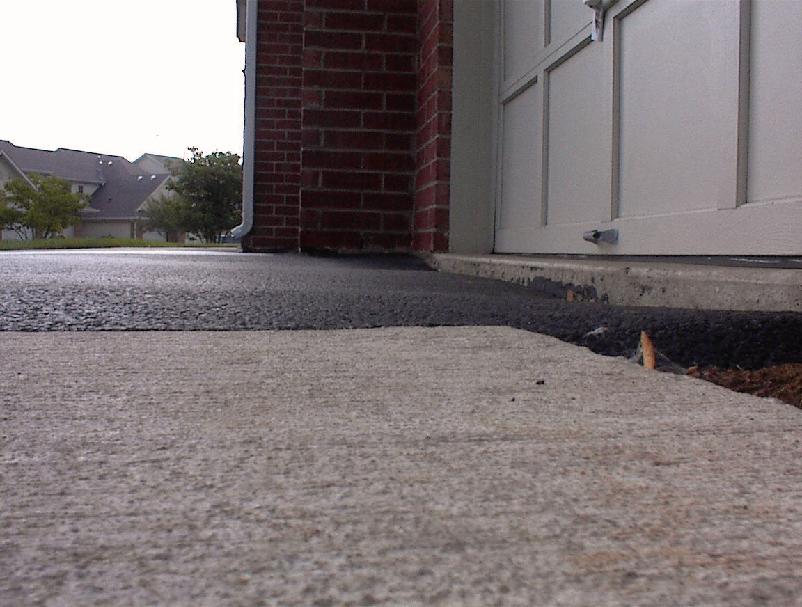 Why Is My Asphalt Sinking At The Garage Advisor Asphalt Settlement At The Garage Is A Very Common Problem And Usually Has Nothing To Do With An Insufficient Base Due