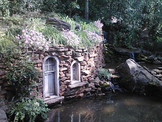 Home in the Secret Garden, made of wood and stone