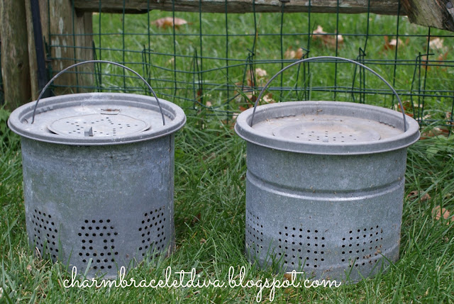 vintage galvanized minnow buckets wire fence grass