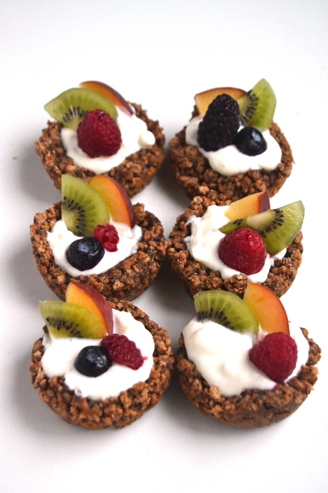 Fruit and Yogurt Cereal Cups make a fun breakfast option that are customizable and tasty. They are kid-friendly and packed with whole-grains, fiber and protein! www.nutritionistreviews.com
