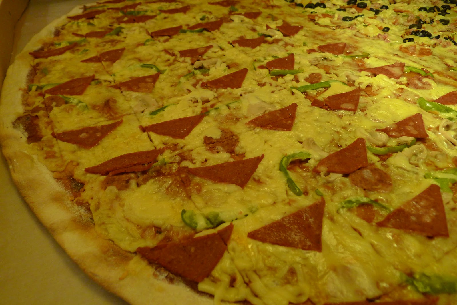 Big Guys Pizza, Home of the 36inch Pizza Tina Villa