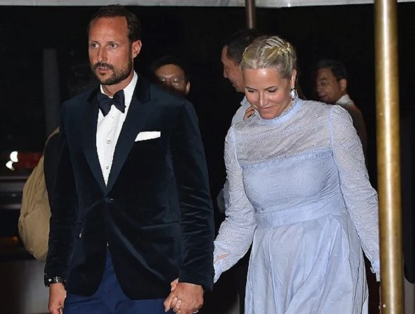 At the Venice Film Festival, Crown Princess Mette Marit wore Vilshenko Lavender Midi Dress