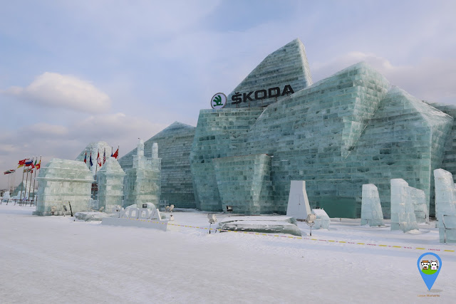Enjoying watching at Harbin Ice Sculpture Exhibition as these sculptures are designed by using big blocks of ice in Heilongjiang, China Enjoying watching at Harbin Ice Sculpture Exhibition as these sculptures are designed by using big blocks of ice in Heilongjiang, China