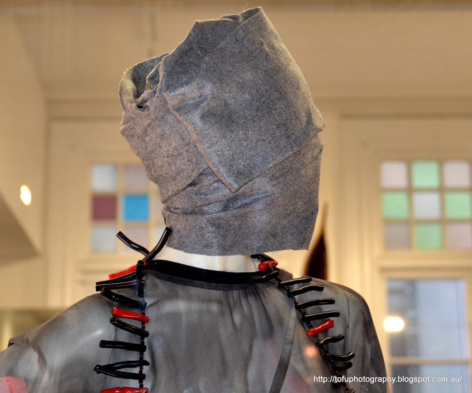 Tofu Photography A mannequin with a hoodie type head covering in the