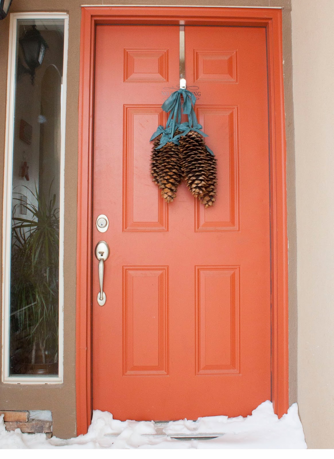 creatively christy DIY Pine Cone Door Decor