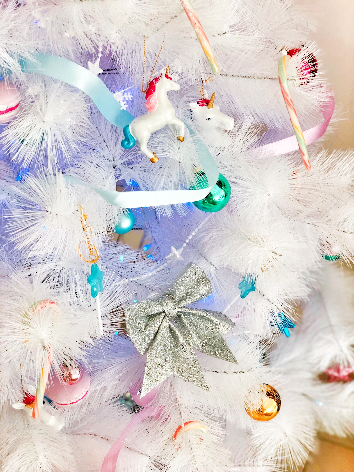Pretty White Christmas Tree with magical Unicorn baubles