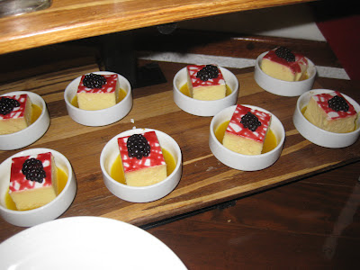 small ramekins of cheesecake and blackberries