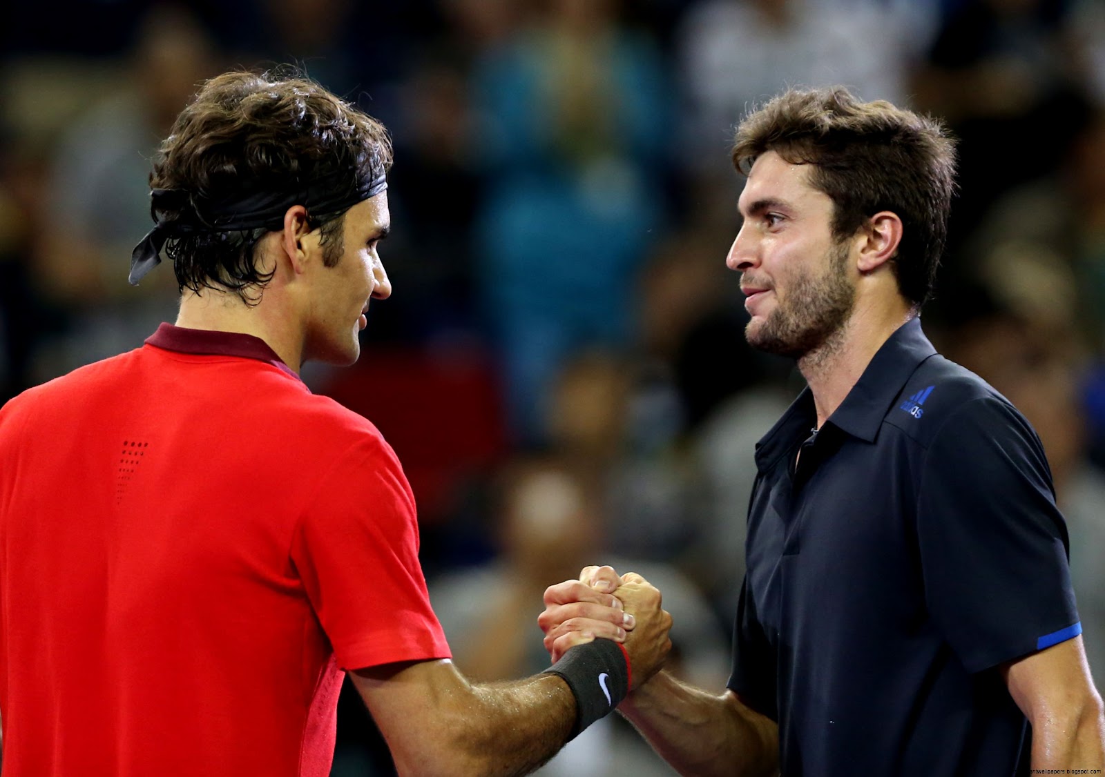 SHANGHAI CHINA   OCTOBER 12 Roger Federer of Switzerland and Gilles