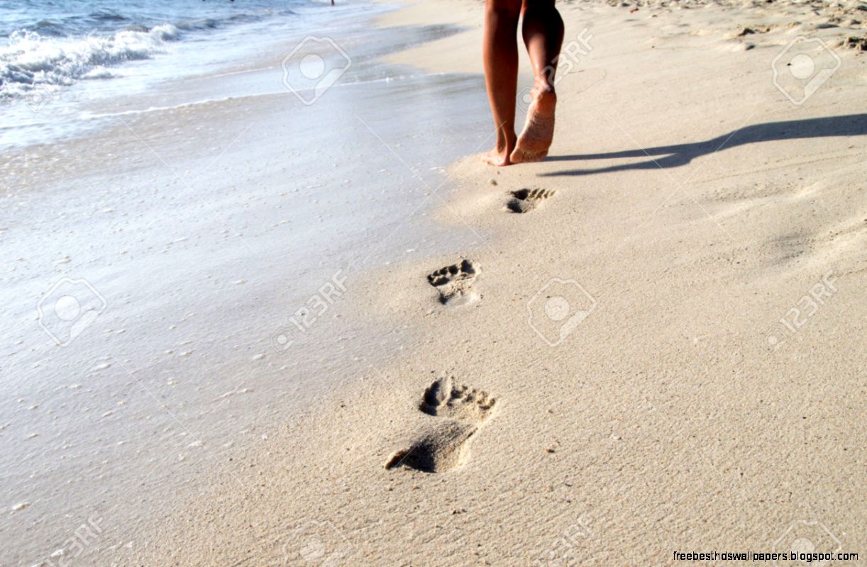 Footprints In Wet Sand Of Beach Stock Photo Picture And Royalty