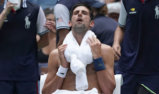 Djokovic through at steamy US Open