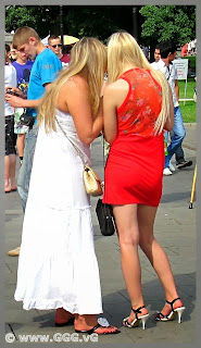 Girls on the street wearing summer dresses  