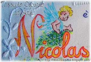 pittura su stoffa con pennarelli indelebili nome Nicolas e angelo