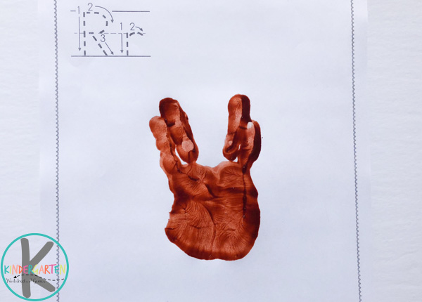 brown handprint without pressing thumb brown handprint without pressing thumb
